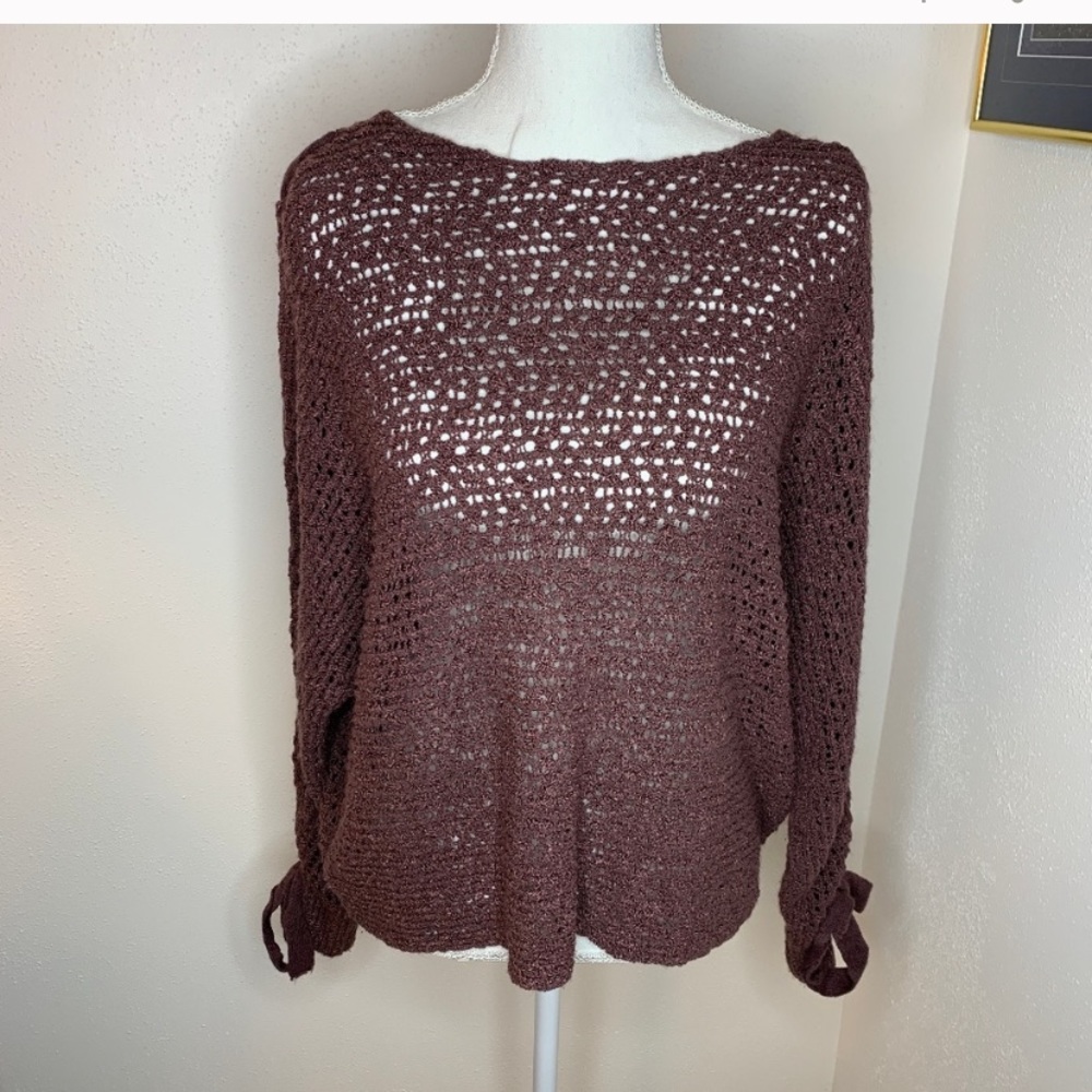 Purple peplum mesh sweater